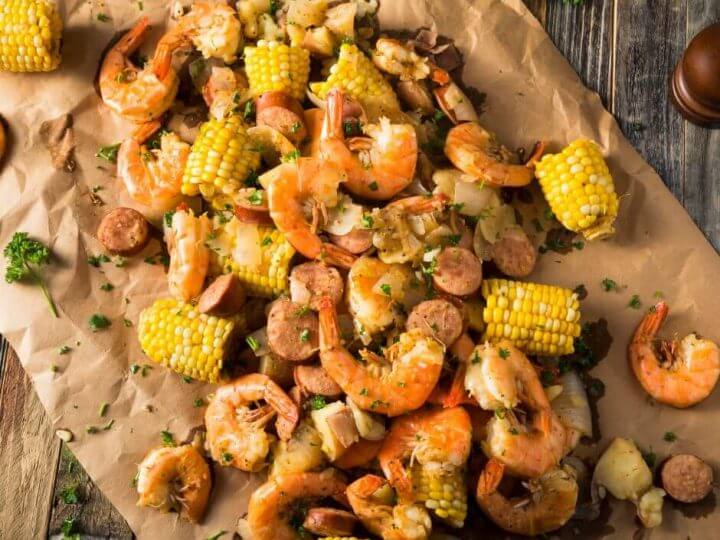 a table of food from a low country boil