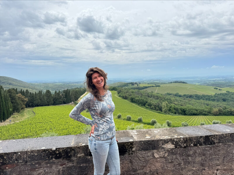 a woman at a vineyard