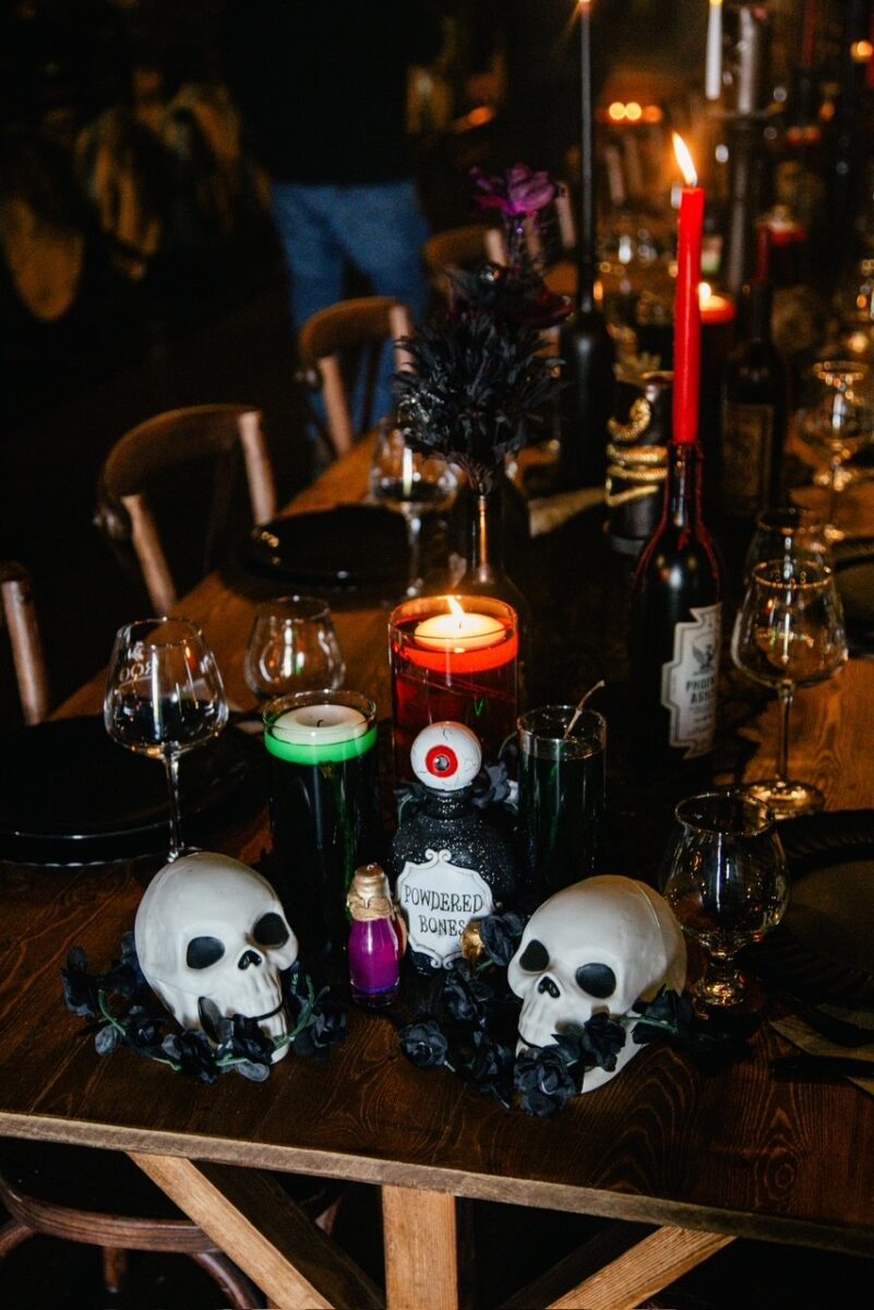 a table decorated with Halloween items