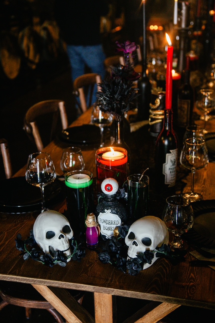 a table decorated with Halloween items